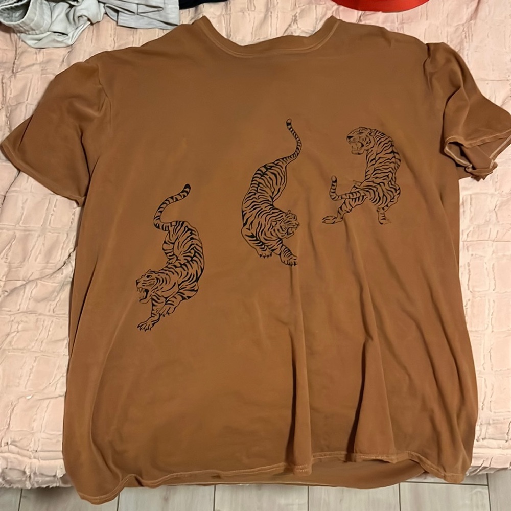 i am selling a never worn urban outfitters shirt